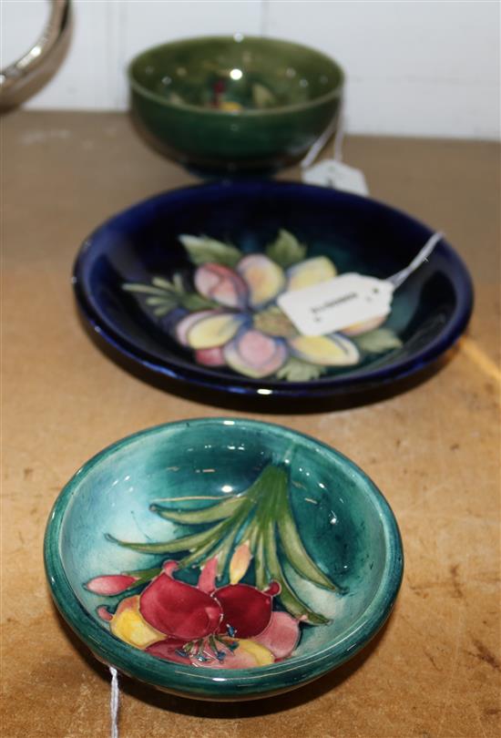 Moorcroft Clematis pattern blue ground small dish (signed) and Hibiscus and Freesia green ground small bowls (3)